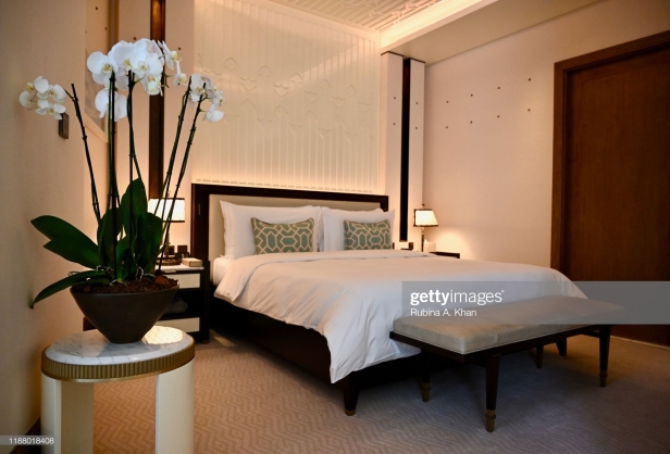 DOHA, QATAR - NOVEMBER 15: A Junior Suite bedroom with the fretwork sand dunes and metallic studs on the walls resembling the old wooden beams in Qatari homes called 'danshal' which extend horizontally from walls at the Mandarin Oriental Doha on November 15, 2019 in Doha, Qatar. (Photo by Rubina A. Khan/Getty Images)