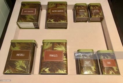 DOHA, QATAR: The mini-bar snacks especially packaged in tin boxes with palm trees at the Mandarin Oriental, Doha in Qatar