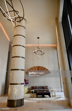 DOHA, QATAR: Fretwork sand dune columns, with a painted eggshell finish, designed by the David Collins Studio, at the main entrance lobby of the Mandarin Oriental, Doha in Qatar
